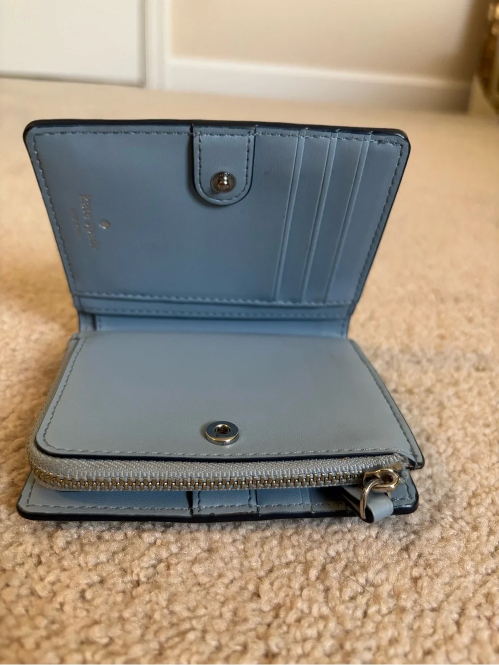kate spade pale blue leather zip-around wallet